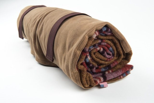 on the road west america and woolrich wrxwa poncho roll