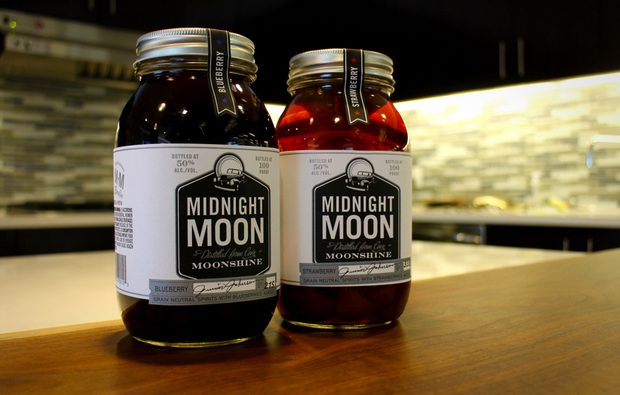 Strawberry blueberry jars with fruit, midnight moon, moonshine, liquor