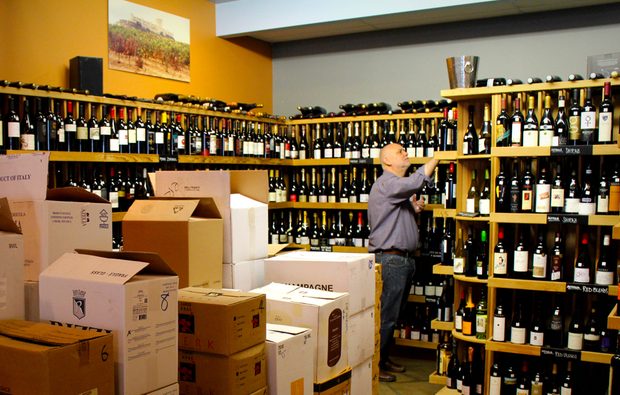 selecting wine bottles