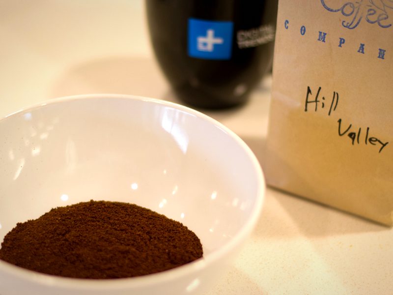 Coffee grounds, mug and, bag of coffee