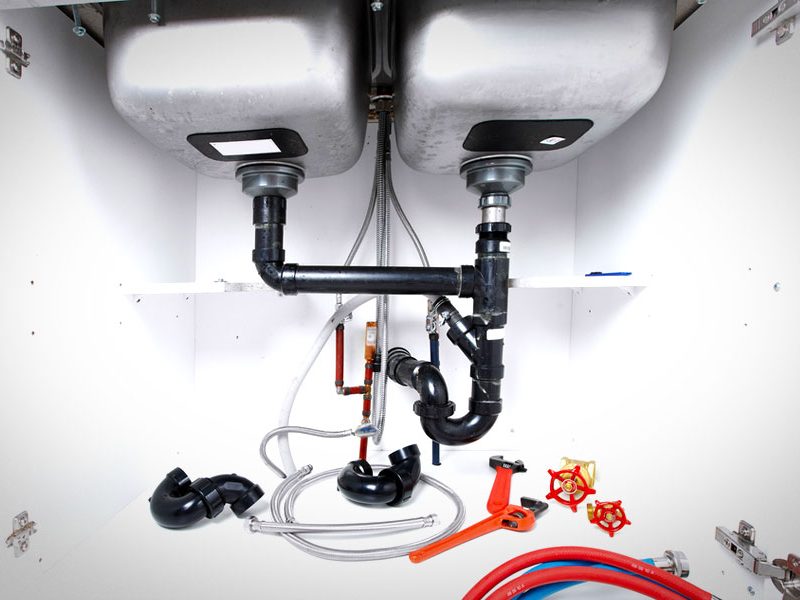 The underside of a kitchen sink