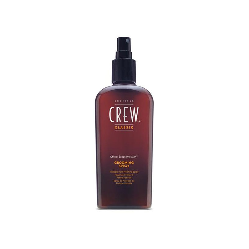 A bottle of American Crew Grooming Spray on a white background.