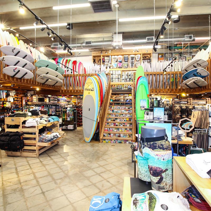 Swimming attire and surfboards in Island Water Sports.