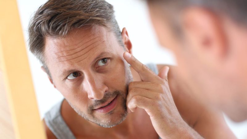 Generic-Man-Putting-on-Lotion, best face moisturizers
