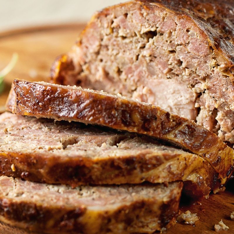 Meatloaf sliced on a serving tray.