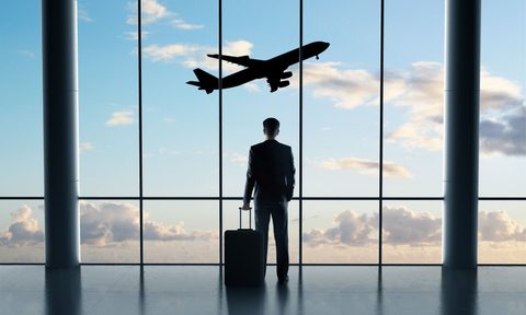 A person at the airport waiting for their flight.