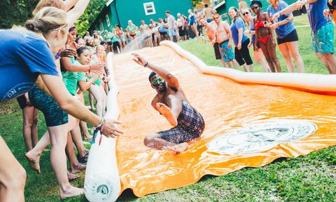 Camp No Counselors People Using a Waterslide