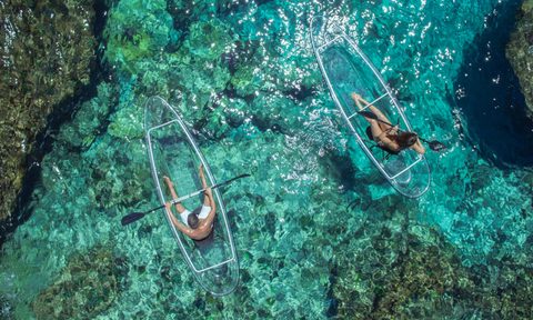 clear kayak, women clear kayak in blue water