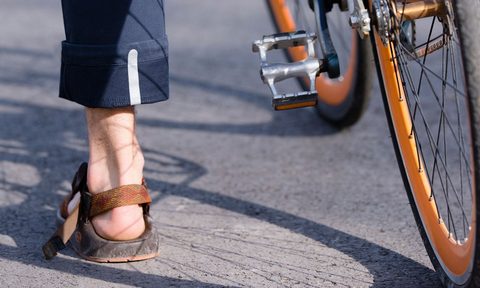 commuter pant, mountain khakis, rolled up pant leg on bicycle