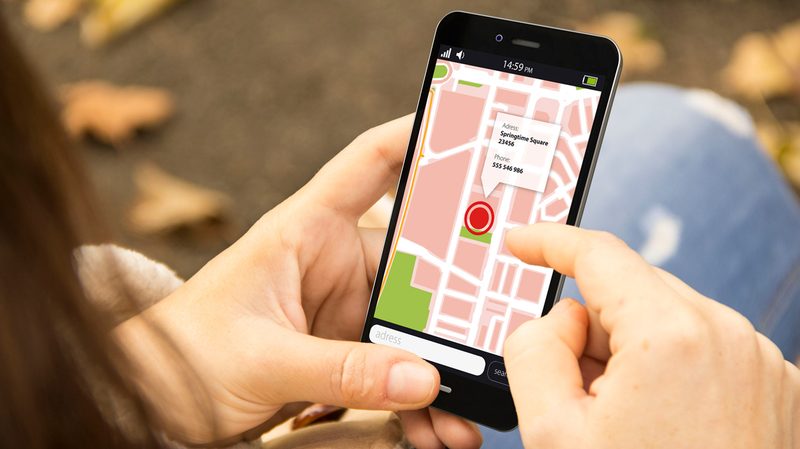 Stock-Person-using-gps-on-phone