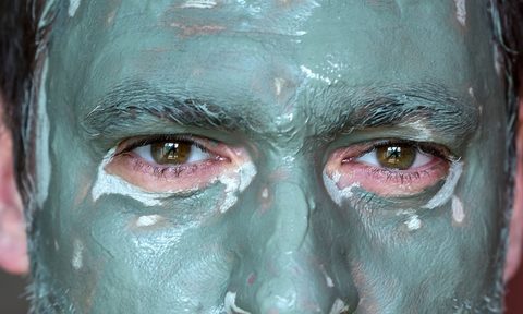 Man in mud mask