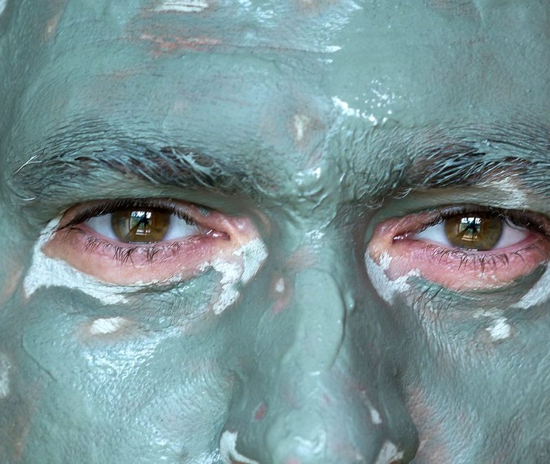 Man in mud mask