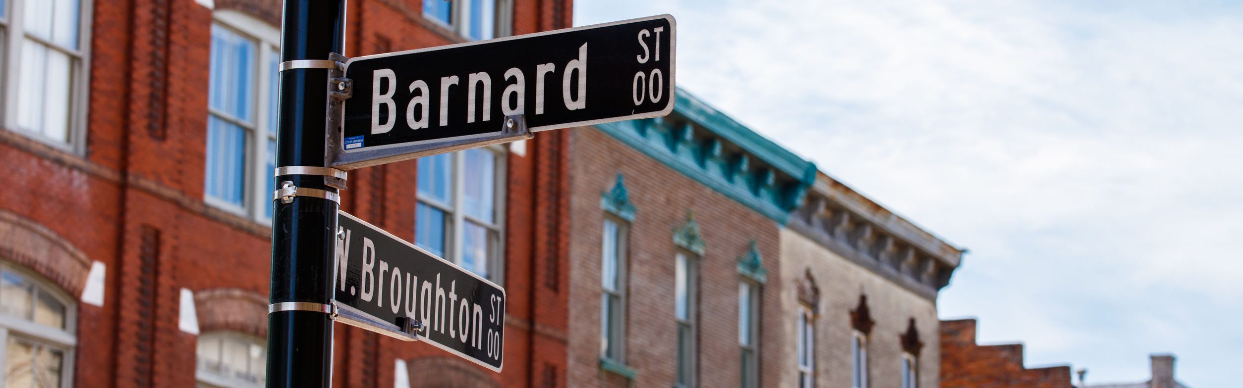 Downtown Savannah, Georgia cityscape with street signs