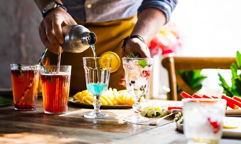 Man preparing quick cocktails at home