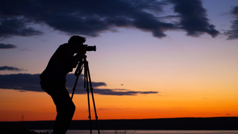photographer using tripod