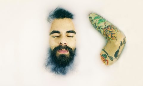 man taking a bath with natural body wash