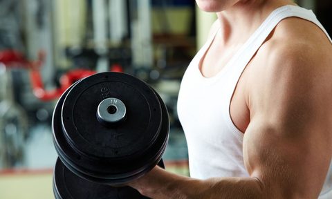 workout recovery, man doing bicep curls