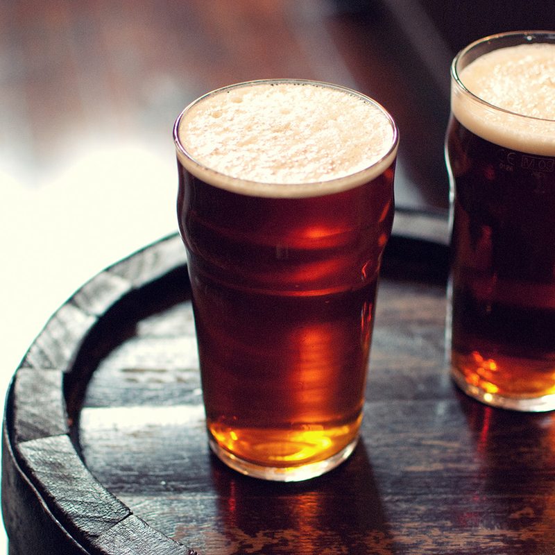 Beer on a wooden barrel