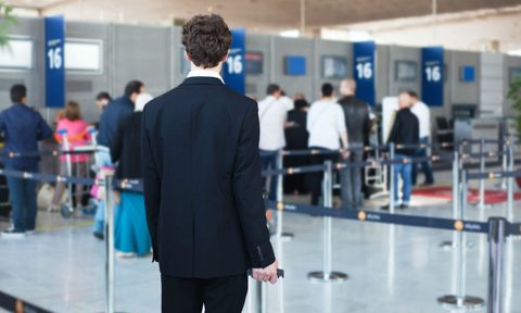 Person about to get in line at the airport.