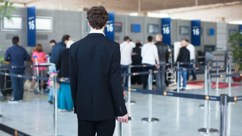 Person about to get in line at the airport.