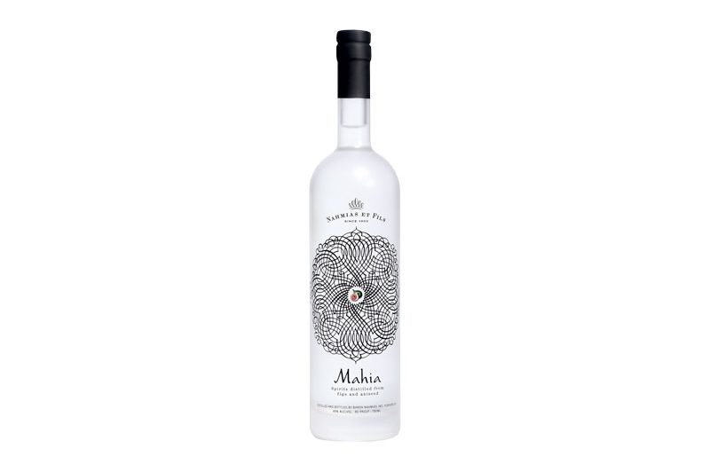 mahia fig brandy from morocco in bottle on white background