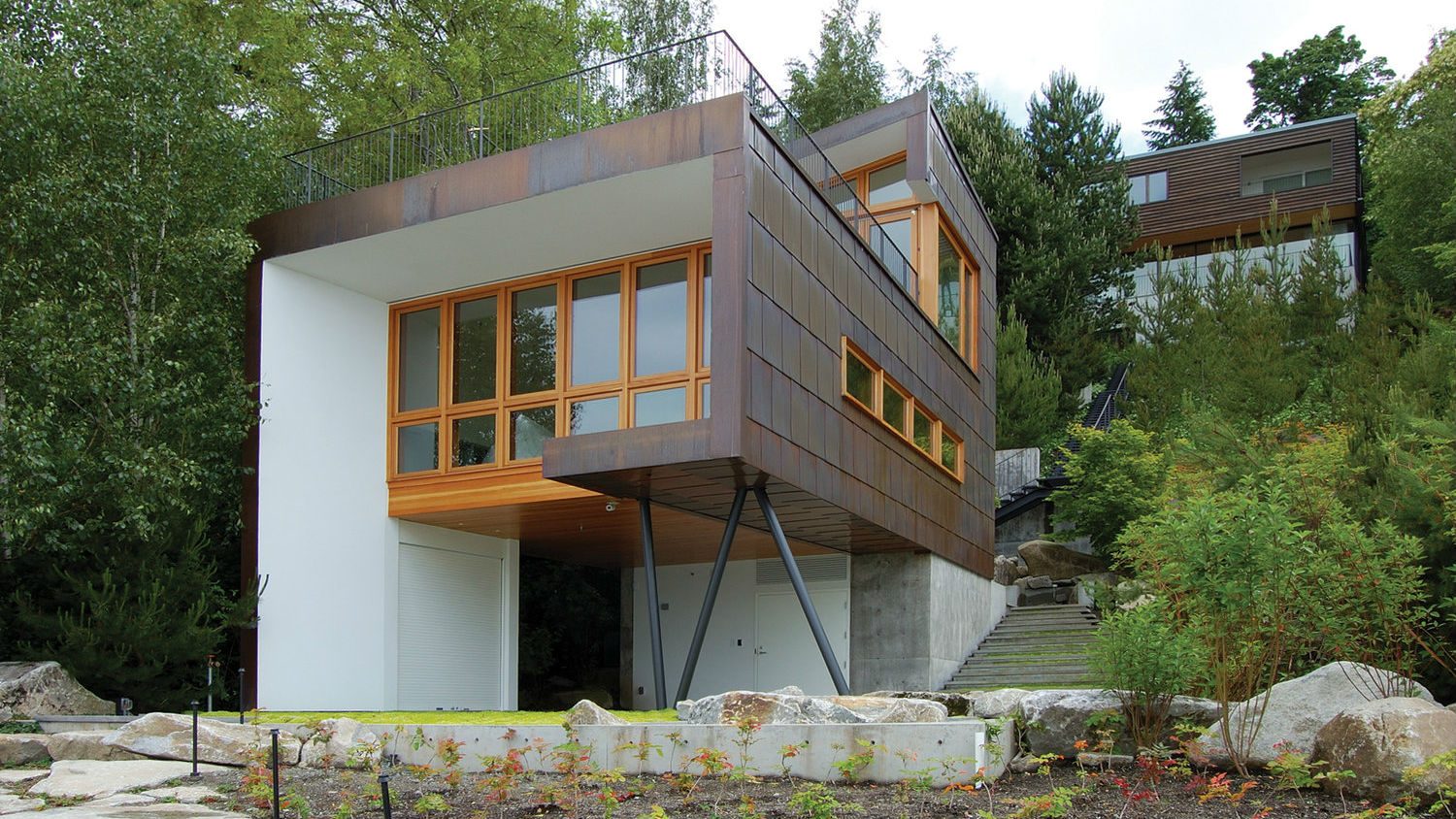 copper guest house on a lake