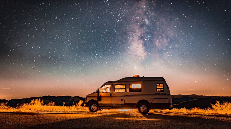 beau mirchoff van in front of starry night sky and milky way