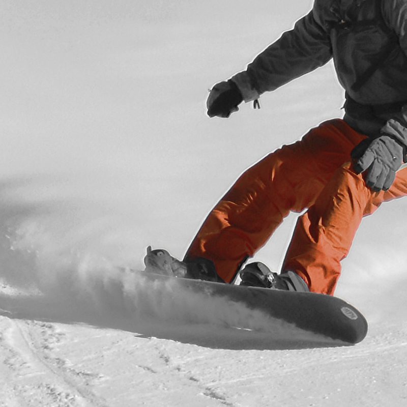 A man snowboarding