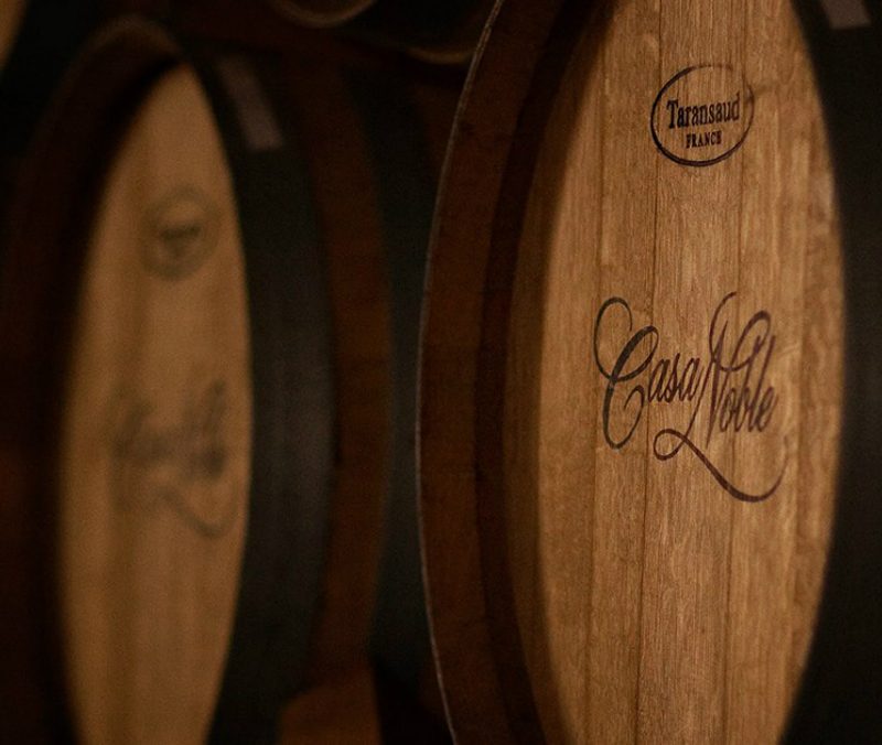 A Casa Noble tequila barrel stack