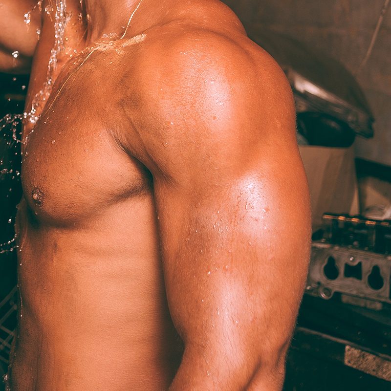 Man with large arm muscles