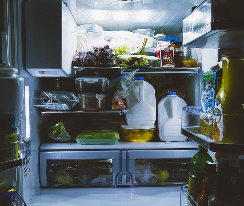 messy fridge that needs to be cleaned