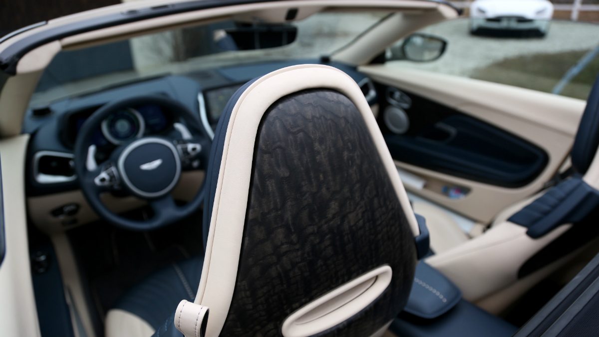 aston martin db11 volante first drive interior blue cream 2