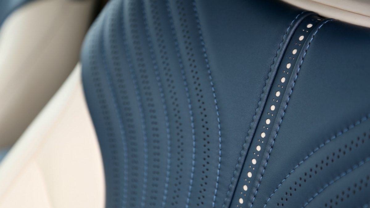 aston martin db11 volante first drive interior blue cream leather detail