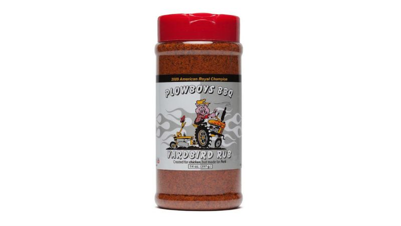 The Plowboys BBQ Yardbird Rub features a pig on its packaging that's wearing a construction uniform while riding on a tractor.