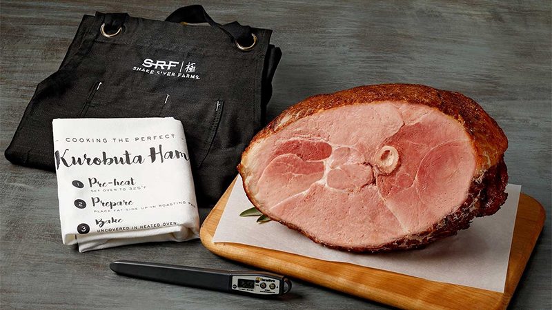 snake river farms and a ham on a cutting board.