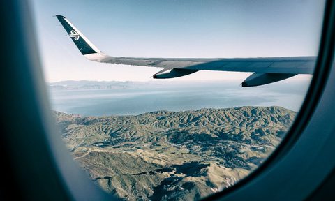 airplane window mountain travel