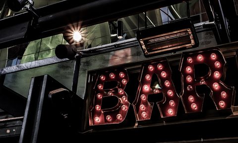 how to buy a round of drinks bar front sign
