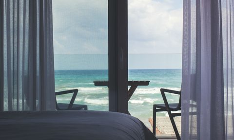 hotel bed beach view