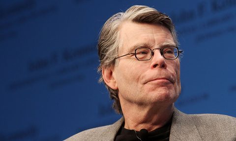Stephen King during a reading of a novel' during The 'Kennedy Library Forum Series'