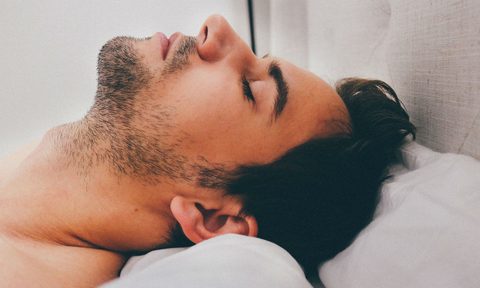 man sleeping bed pillow
