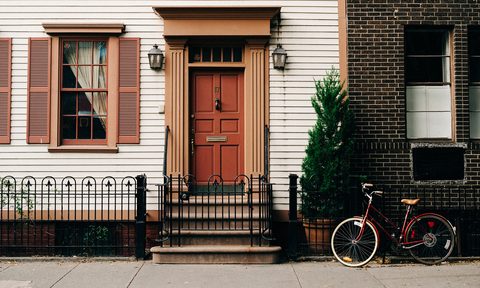 how to be an airbnb host apartment front door with bike