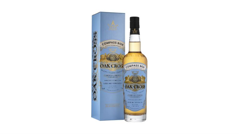 A bottle and it's packagint of COMPASS BOX OAK CROSS.