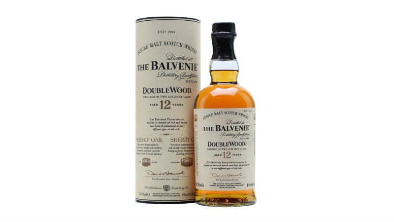 A bottle of Balvenie Double Wood 12 and the tin in which it is packaged.