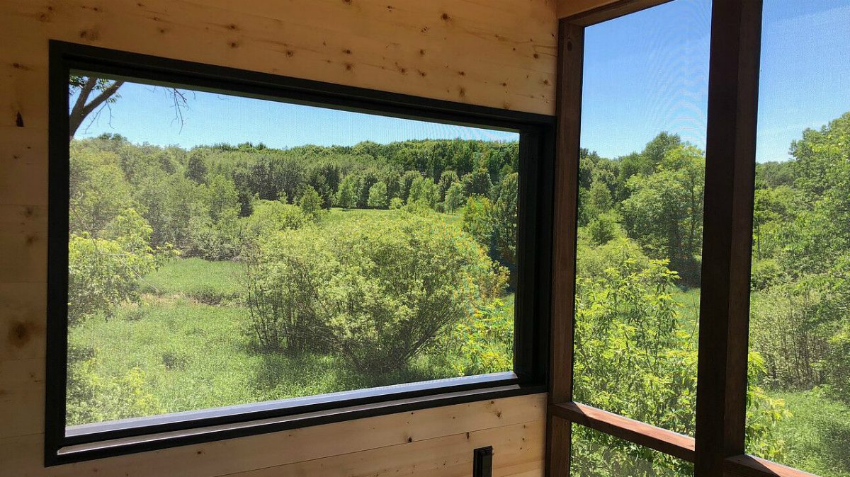 escape tiny house travel home with porch 2