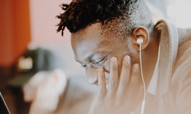 Person listening to podcast
