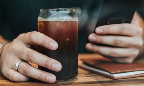 man drink phone travel