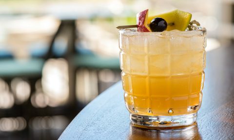 A refreshing glass of Miami Godfather on a table.