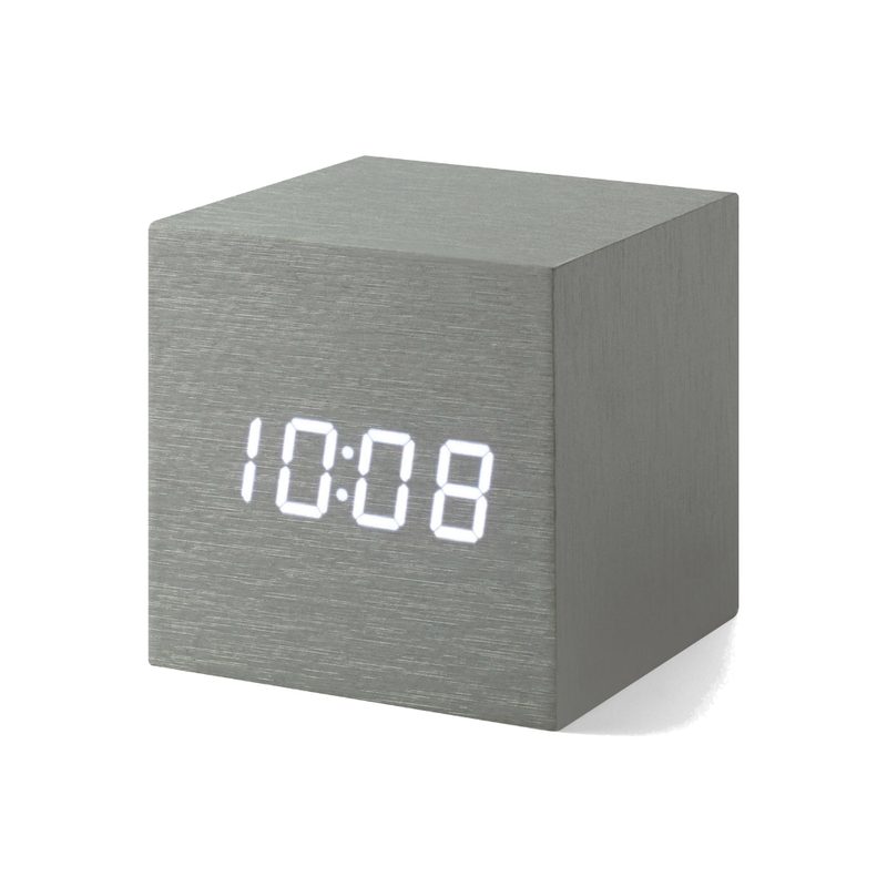 A Moma Alume Cube Clock showing 10:08.