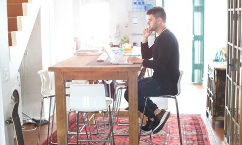Man sitting at desk with good posture.