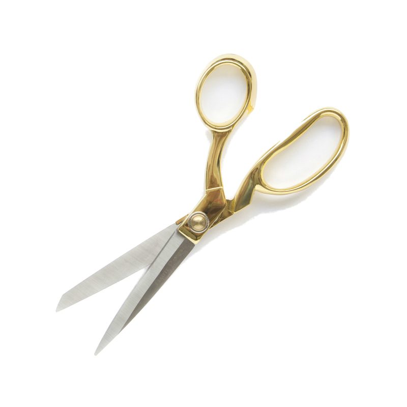 A golden Haute Papier scissors.